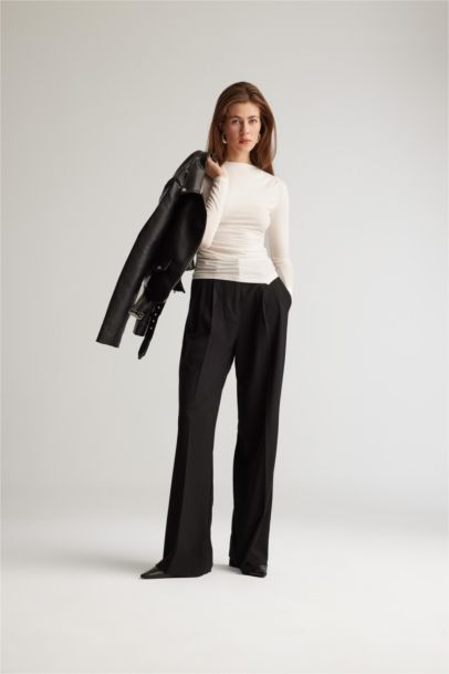 Pantalon large taille haute avec fermeture zip et poches