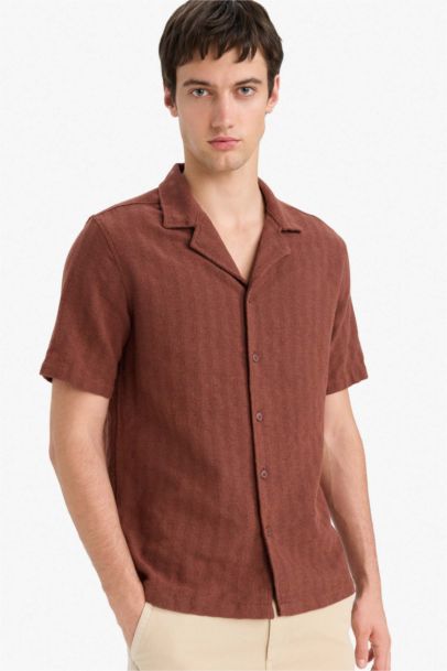 قميص بولو نص ردن قصة عادية بياخة عالية