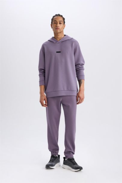 بنطلون بجامة رياضي جوجر قماش سكوبا قصة عادية من DeFactoFit