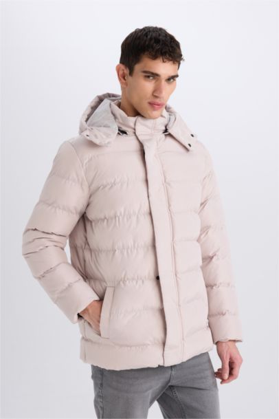 قمصلة نفخ قصة عادية بغطاء للرأس بسحاب وجيب