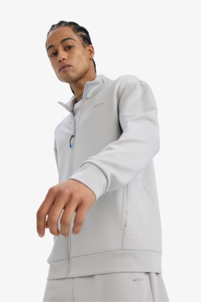 سويت شيرت بسوستة مطبوع قصة عادية بياقة عالية بجيب مزدوج