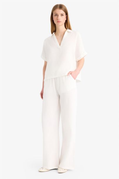 Брюки с широкими ногами, двойными карманами и эластичной талией из крючкового материала