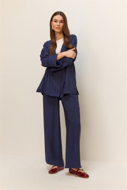 Pantalon large en tissu froissé