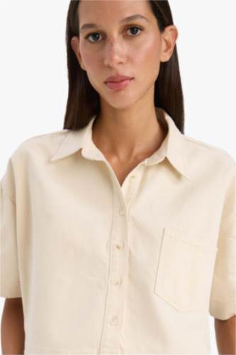 Chemise en jean courte avec poches