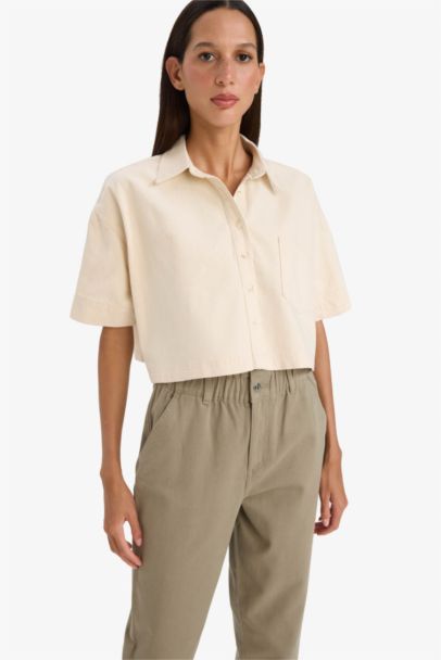 Chemise en jean courte avec poches