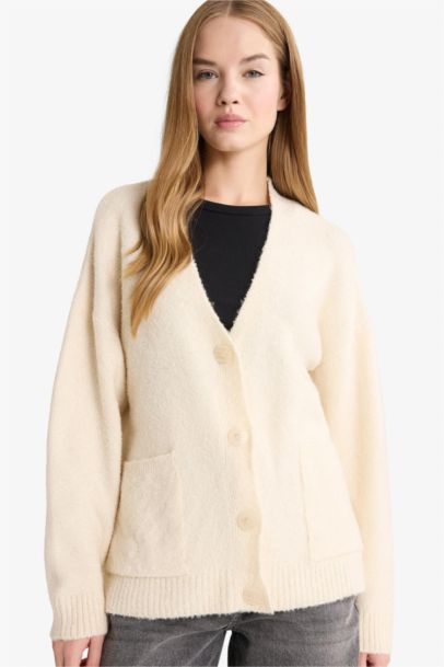 جاكيت صوف تريكو اوفر سايز بياخة V