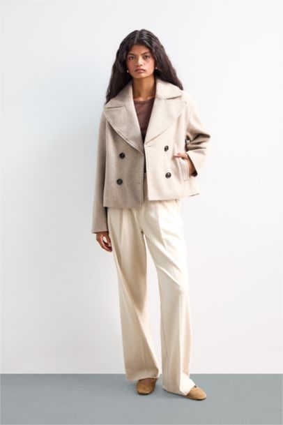 بالطو صوف بأزرار و قصة عادية