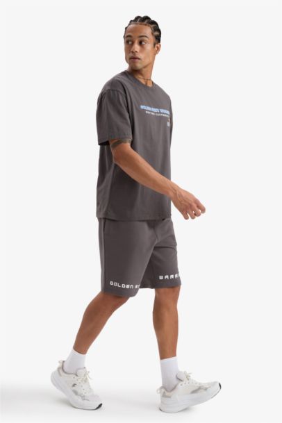 Шорты DeFactoFit NBA Golden State Warriors стандартной длины и посадки.