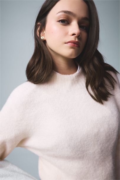 Pull tricot basique sans couture à col rond et coupe régulière