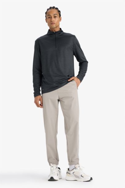 Slim Fit Dar Kesim Dik Yaka Çabuk Kuruyan Nefes Alabilen Esnek Kumaş Fermuarlı Sporcu Uzun Kollu Body