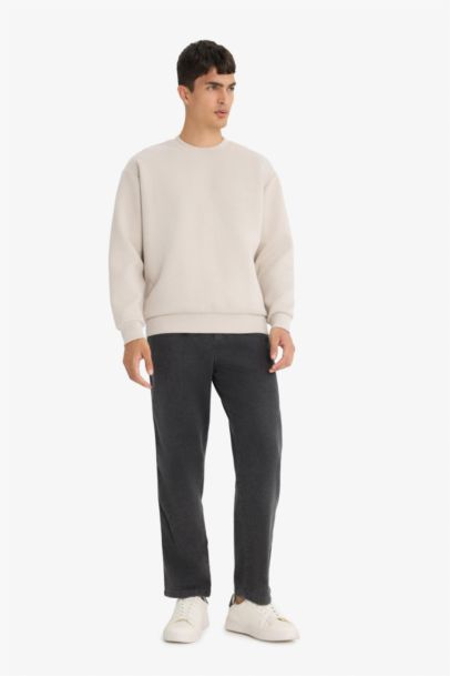 سويت شيرت قصة مريحة بياقة مستديرة