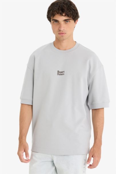 تيشيرت نص كم قصة فضفاضة مطبوع