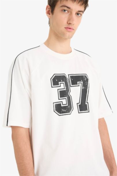 تيشيرت قطن نص ردن قصة فضفاضة بياخة مستديرة