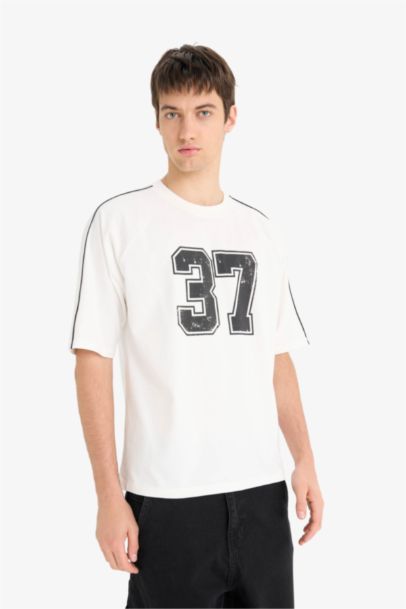 تيشيرت قطن نص ردن قصة فضفاضة بياخة مستديرة