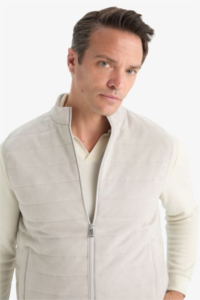 Gilet en suédine mi-saison à col montant zippé avec poches