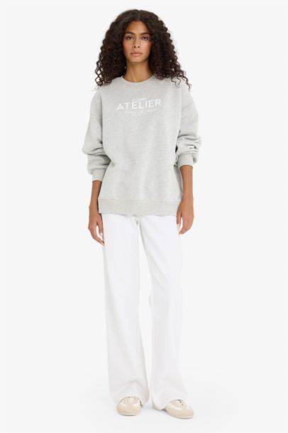 سويت شيرت تقيل اوفر سايز بياخة مستديرة