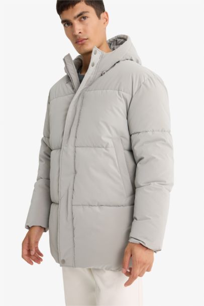 قمصلة نفخ طويل قصة عادية بغطاء للرأس مقاوم للماء