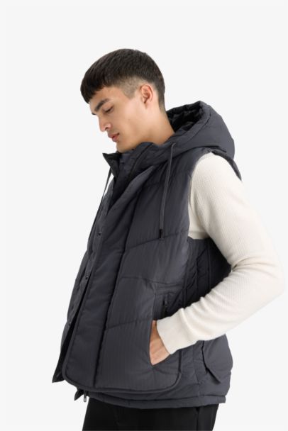 Gilet matelassé à capuche et fermeture zip Coupe régulière