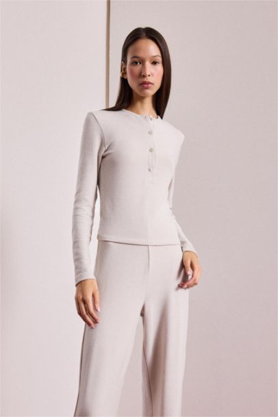 تيشيرت كم طويل مخصر بياخة بأزرار