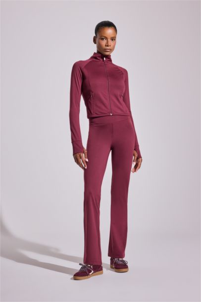 جاكيت رياضي سليم فيت بياخة عالية بجيب وبطانة ناعمة من DeFactoFit