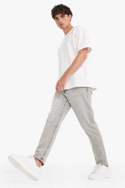 بنطلون جينز 90’S سليم فيت بساق ضيق