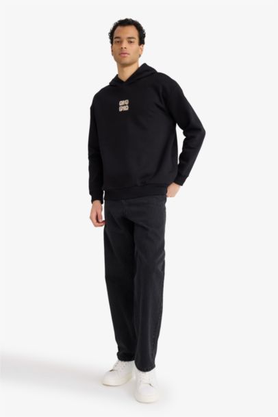 سويت شيرت مطبوع أوفر سايز بغطاء للرأس