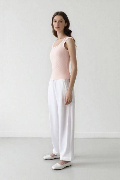 Pantalon palazzo blanc taille haute à jambes larges avec poches