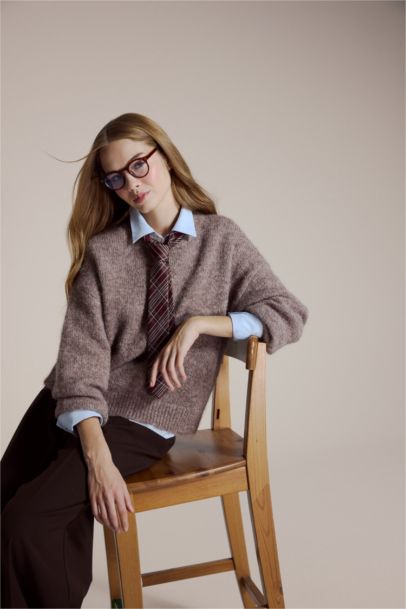 بلوز صوف تريكو اوفر سايز بياخة عالية من مزيج الصوف