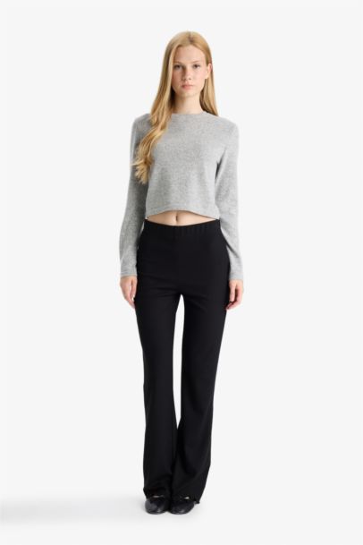 T-shirt slim à col rond et manches longues