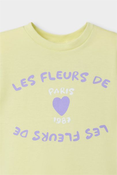 تيشيرت بناتي نص ردن بطبعة شعار قصة عادية بياخة مستديرة