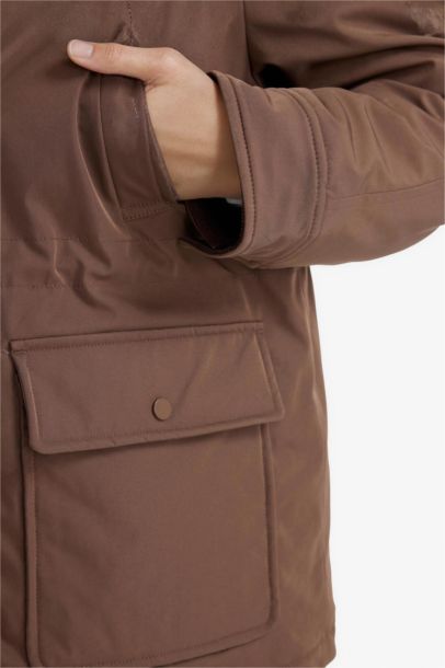 جاكيت طويل قصة عادية بياقة بولو