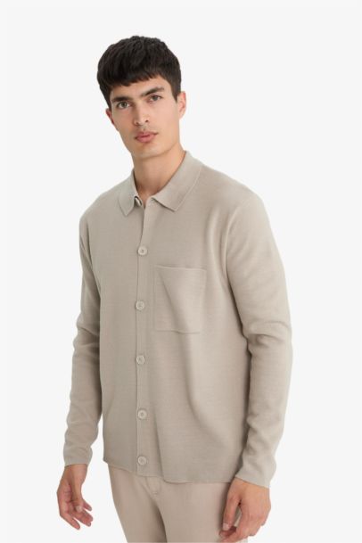 جاكيت تريكو قصة عادية بياخة بولو بجيب