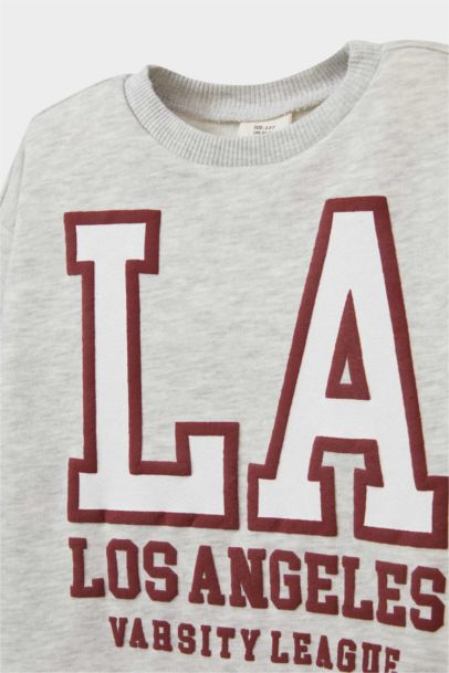 Sweatshirt imprimé à col rond pour bébé fille