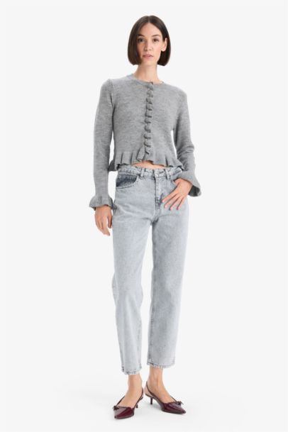 جاكيت تريكو قصة عادية بياخة مستديرة