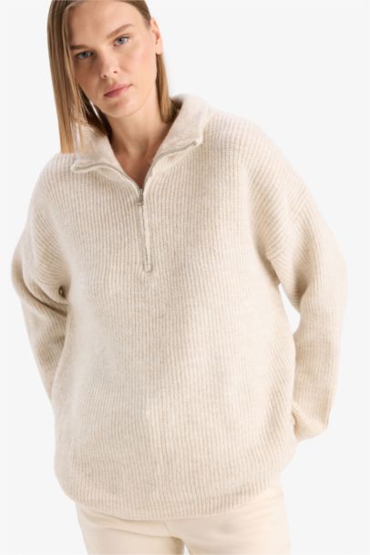 بلوز تريكو قصة مريحة وياخة عالية بسحاب