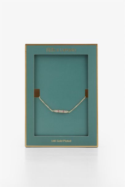 سوار نسائي ذهبي بأحجار من Reis x DeFacto