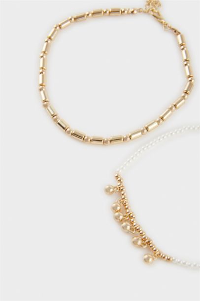 Woman 4 Piece Gold Bracelet