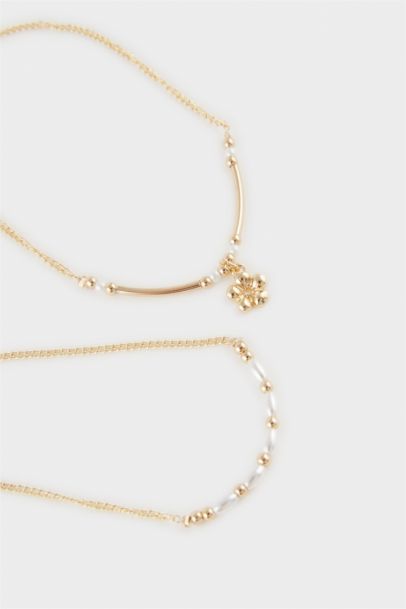 Woman 4 Piece Gold Bracelet