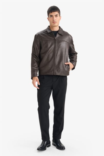 جاكيت جلد صناعي قصة عادية بياخة بولو وجيب من الداخل