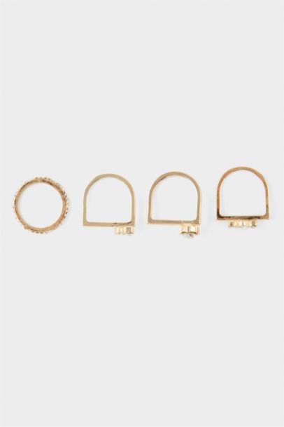 Woman 4 Piece Stoned Gold Rings