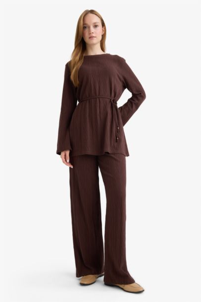 Pantalon ample à jambes très larges