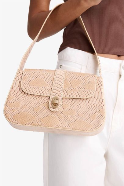 شنطة كتف حريمي بيج