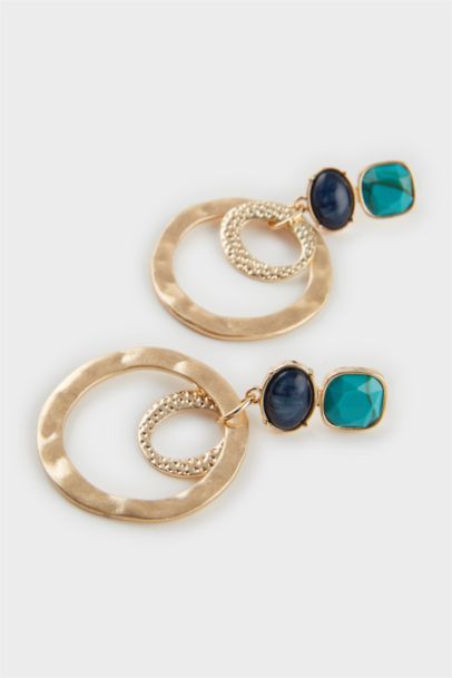 Woman Golden Earrings With Blue Stones