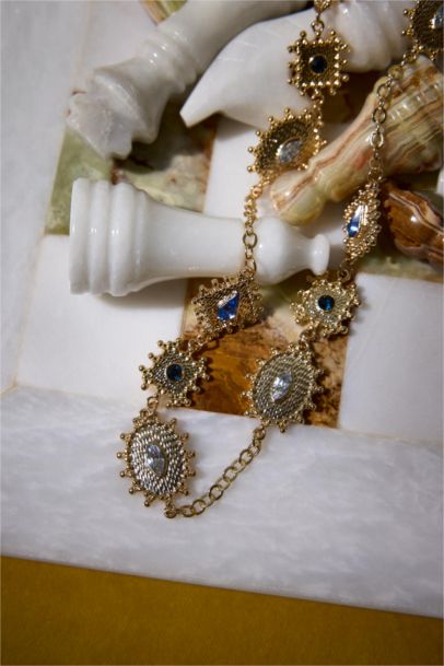 Woman Golden Necklace With Stones