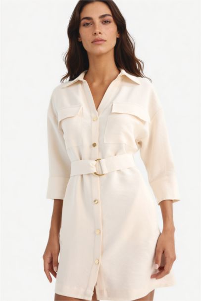 Регулярного кроя мини-платье с длинными рукавами.