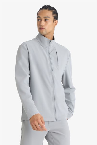 جاكيت قصة عادية بياقة عالية بجيب فليتو