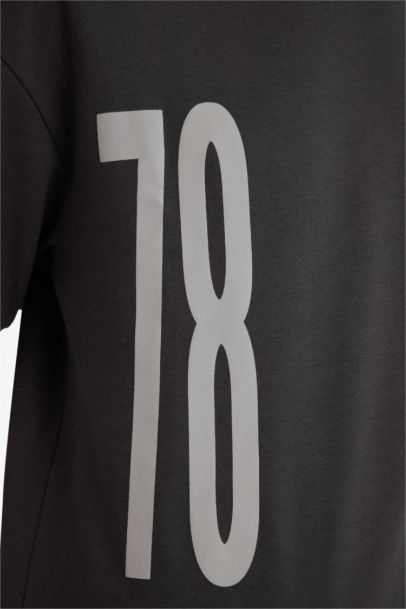 تيشيرت نص كم قصة فضفاضة قماش يسمح بمرور الهواء