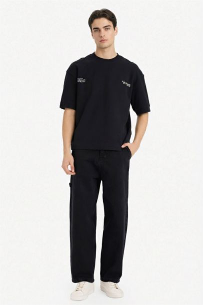 تيشيرت نص كم قصة فضفاضة قماش يسمح بمرور الهواء