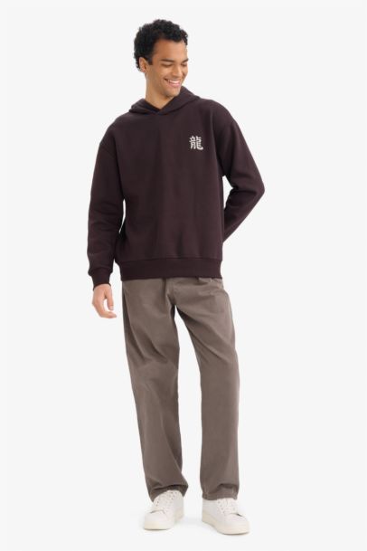 سويت شيرت مطبوع أوفر سايز بغطاء للرأس