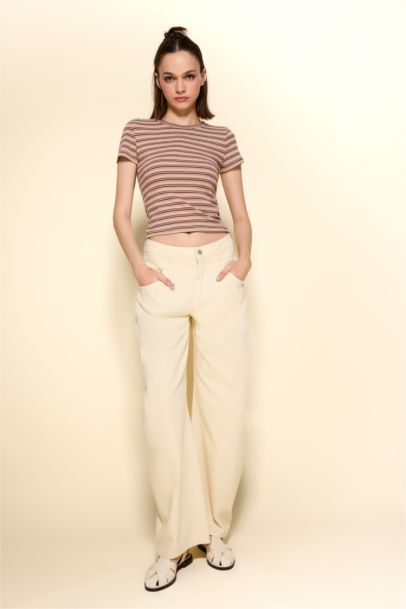 بنطلون باجي فيت بخصر عادي